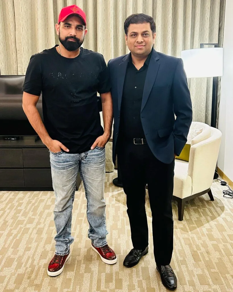Yogesh Kumar with cricketer Mohammad Shami at corporate event in Ahmedabad